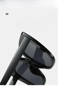 Detail of cat eye sunglasses hinge showing lightweight and flexible black frame material
