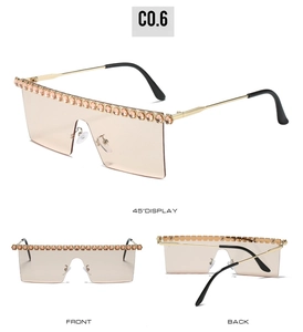Vues détaillées de lunettes de soleil sans monture champagne avec strass ambrés