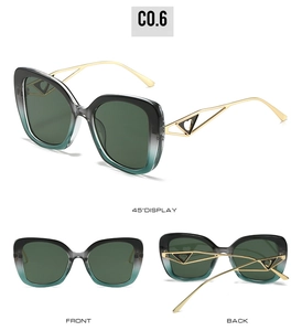 Lunettes de soleil œil de chat rétro avec monture dégradée et branches en métal doré