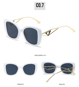 Trois vues de lunettes œil de chat blanches avec branches dorées à motif de cœur