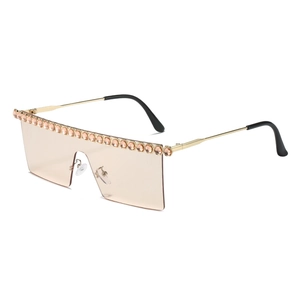 Lunettes de soleil carrées oversize avec verres champagne et bordure en strass brillant