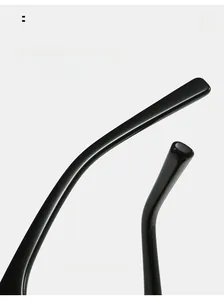 Detail view of ergonomic curved temple arm on black glossy oversized square sunglasses