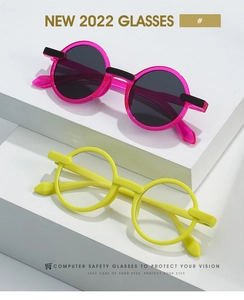Detail view of stylish round frames in rose and yellow colors for 2022 fashion trend