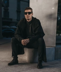 Outdoor urban shot of stylish oversized black sunglasses for a modern fashion look