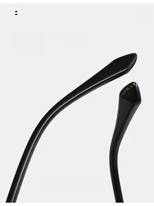 Detail of curved ergonomic black sunglasses legs for enhanced wearing comfort