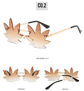 Detailed views of gold leaf-shaped sunglasses with brown gradient lenses and metal frame
