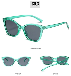 Vues détaillées de lunettes de soleil œil de chat avec monture turquoise et verres gris