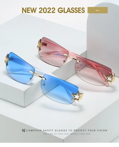 Detail of rimless square Y2K sunglasses with star metal accents and gradient lenses