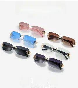 Detail showing colorful rimless rectangular Y2K sunglasses with star metal accents