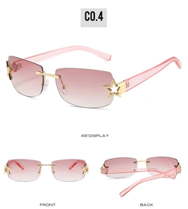 Detail view of rimless square Y2K sunglasses with pink gradient lenses and star accents