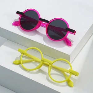 Fashionable round frame kids sunglasses in vibrant rose pink and bright yellow colors