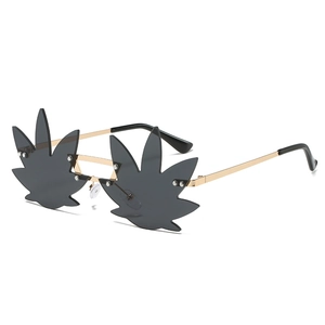 Trendy leaf shaped rimless sunglasses with gold metal frame and dark grey lenses