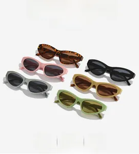 Flat lay of colorful Y2K punk cat eye cycling sunglasses in six different vibrant shades