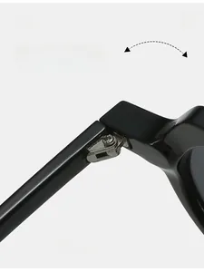 Macro detail of a durable metallic texture hinge on classic round retro sunglasses
