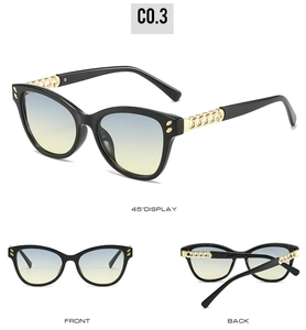 Cat eye sunglasses with gold chain temples and blue-yellow gradient lenses detail