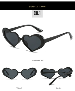 Three-angle view of black heart-shaped sunglasses with dark UV lenses and resin frame