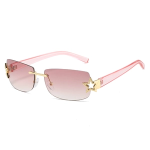 Occhiali da sole a giorno Y2K con lenti rosa sfumate e stelle metalliche oro