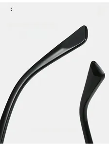 Close-up of curved glossy black sunglass arms with ergonomic arc for comfortable wear