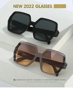 Stacked view of oversized geometric sunglasses with black and transparent grey frames