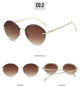 Three-way view of oval sunglasses with brown gradient lenses and gold metal temples
