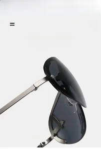 Detail view of silver metal aviator frame showing its lightweight and elastic texture