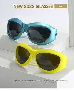 Detail view of large steampunk sunglasses with light blue and matte yellow frames