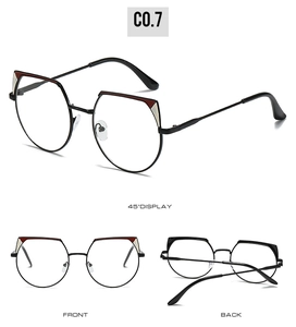 Detail view of cat eye glasses frames with red and white triangular accent and multi-angle display