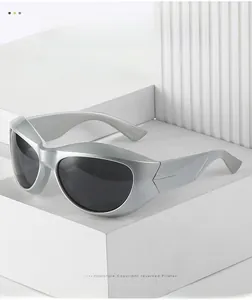Macro detail of silver streamlined steampunk sunglasses with translucent dark grey lenses