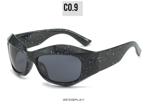45-degree side view of oversized black sunglasses with purple starry splatter texture