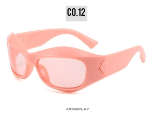 Close-up of pink Y2K sports sunglasses featuring wide frames and triangle temple details