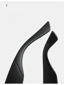 Macro view of ergonomic curved matte black sunglasses legs with anti-slip texture