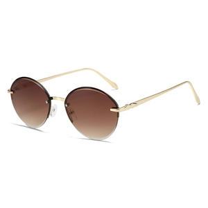 Minimalist oval metal sunglasses with brown gradient lenses and gold frames in 45-degree view