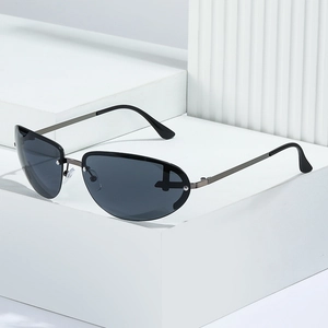 Minimalist rimless sports sunglasses with dark gray lenses and gunmetal frame on white stand