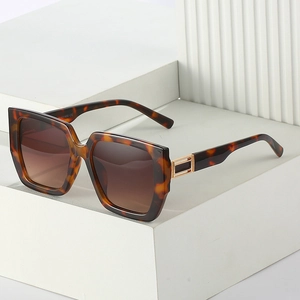 Chic tortoiseshell square oversized sunglasses with gold metal accents and UV400 lenses