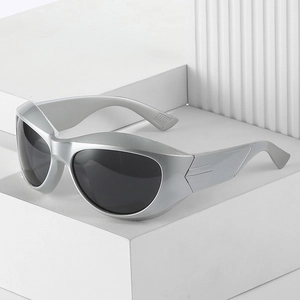 Silver steampunk wraparound sunglasses with dark gray lenses in futuristic design