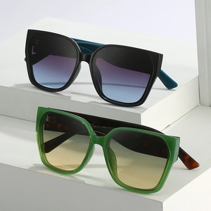 Vintage oversized square sunglasses with gradient lenses on white geometric stands