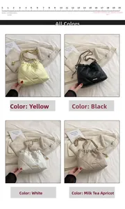 Quilted drawstring bucket bag with chain strap shown in yellow black white and apricot