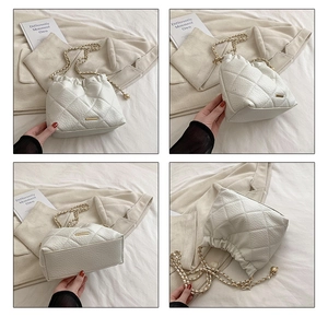 Detailed views of white quilted bucket bag featuring chain strap and drawstring closure