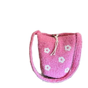 Pink plush crossbody bag with flower embroidery and drawstring closure for women