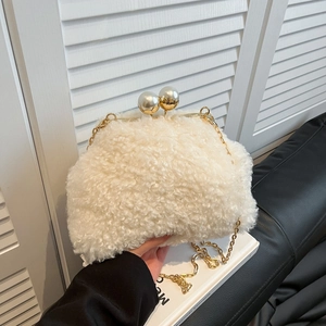 Chic beige plush chain bag with lamb wool texture and elegant pearl clasp detail