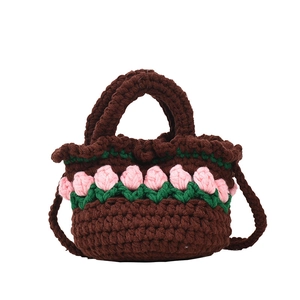 Brown crochet hand-knitted tote with pink tulip pattern and adjustable strap