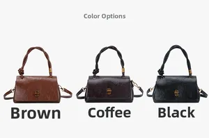 Detailed view of three vintage crossbody bags in brown, coffee and black with metal locks