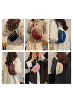 Detail of multi-color corduroy crescent chest bags with wide adjustable straps and double zippers
