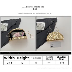 Size guide for gold evening clutch showing 23.5cm width and internal storage capacity