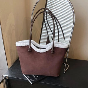 Vintage brown suede tote bag with white faux shearling trim and slim shoulder straps