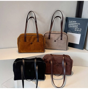 Detailed display of four vintage matte leather tote bags in yellow, grey, black and coffee
