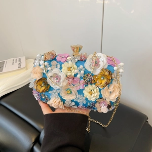 Royal blue floral evening clutch bag with colorful handmade flowers and gold chain strap