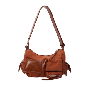 Caramel vintage messenger bag with multi-pockets and mixed leather textures on white background