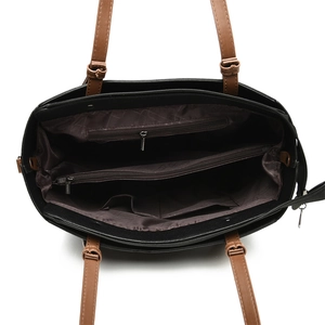 Top view of spacious interior compartments with zipper pockets in black tote bag