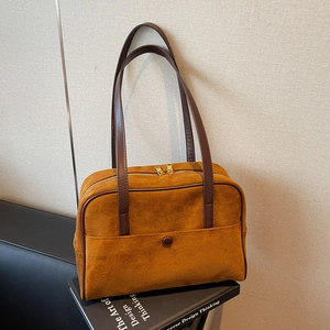 Vintage brown suede shoulder bag with long leather handles and gold metal zippers